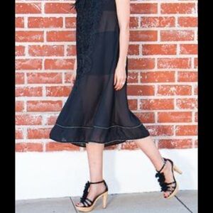 Wooden heels with fabric embellishment